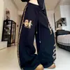 Pantalones deportivos negros estilo americano con estampado de leopardo y letras, pantalones de jazz para mujer, pantalones deportivos casuales holgados de pierna ancha curva
