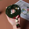 Flor flotante de Dunhuang Jade Blanco Raíz de Bodhi DIY Envejecimiento Grasa Manzana Cuentas sueltas Hombres y Mujeres Pulsera de doble anillo Pulsera Cuentas de Buda Venta al por mayor