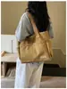 Nova bolsa de ombro feminina transfronteiriça, cor sólida, simples e casual, bolsa de mão de tecido, versátil para o trabalho e estudantes, bolsa tote