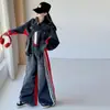 Conjunto de mezclilla de otoño para niñas 2026 nuevo moderno genial estilo coreano para niñas mayores con conjunto de mezclilla de retazos a rayas