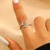 Joyería Transfronteriza Europea y Americana Anillo Abierto de Corazón de Amor Personalizado Moda Simple Accesorios de Mano de Lujo Ligero para Mujeres Venta al por Mayor de Vacaciones