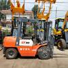 Montacargas diésel tipo automóvil 1.5 toneladas elevado 3 metros montacargas de cuatro ruedas almacenamiento de fábrica vehículo para transporte de objetos grandes