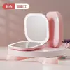 Espejo de maquillaje LED de doble cara con lupa, plegable y portátil, con luz incorporada para retoques, espejo compacto de alta definición con tapa abatible