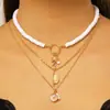 Collar Europeo y Americano Transfronterizo Estilo Marino Multicapa para Mujer, Cadena para Clavícula de Estrella de Mar, Concha, Perla, Collar de Estilo Festivo