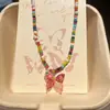 Nuevo Versátil de Perlas Colorido Dopamina Juguetón Contraste Dulce Verano Fresco Mariposa Collar Cadena de Clavícula Gargantilla