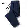 Pantalones de chándal holgados de pierna recta para hombre, talla grande, para primavera y otoño, joggers modernos con bolsillo y cremallera, pantalones casuales elegantes para hombre
