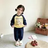 Nuevo conjunto de niña estilo coreano, linda sudadera de encaje con estampado de dibujos animados de manga larga y pantalones jogger, dulce conjunto de dos piezas para bebés