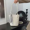 Outono e Inverno 2025 Novo Cesta de Palha Tecida Artesanal Transfronteiriça Casual Cesto Balde Bolsa Feminina Grande Capacidade Ombro Único Simples Versátil