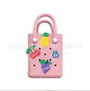 Bolsa de playa de eva Diy agujero EVA bolsa de almacenamiento portátil impermeable gelatina monedero bolso de mano EVA al por mayor