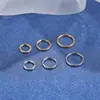 Acero Inoxidable 316L Europeo y Americano Explosiones Comercio Venta Directa Lote Flor Lateral Pirámide Aro para la Nariz