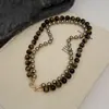 Collar de Piedra Ojo de Tigre con Cuentas para Mujer Serie Maillard Otoño e Invierno Doble Capa Usable Cadena de Suéter Desmontable Moda y Gama Alta