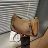 Nova bolsa tiracolo da moda de luxo leve para o início do outono de 2026, bolsa de ombro e sob o braço nova e de nicho para mulheres