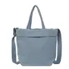 Bolsa Casual Popular Transfronteiriça de Grande Capacidade para Mulheres 2026 Nova Bolsa Leve para o Dia a Dia Bolsa Tote Versátil de Cor Sólida