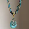 Collar con colgante de gota de agua incrustado de diamantes estilo europeo y americano, cadena para la clavícula de tendencia de moda de alta gama niche, accesorio de lujo ligero único y versátil