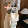 Bolso pequeño súper popular para el trabajo, nuevo bolso de hombro para mujer 2026 otoño nicho para ir al trabajo, bolso bandolera tipo cubo