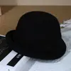 Chapéu de pescador retro francês de lã estilo Hepburn com laço e aba dobrada, chapéu de inverno elegante e versátil para mulheres
