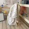 Mochila nueva estilo coreano ins de alta apariencia, fresca, dulce y relajada, con estampado de estrellas, para estudiantes de secundaria y preparatoria, bolsa ligera de doble hombro