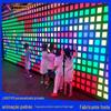 Painel de música interativo com sensor de toque para check-in em shoppings, parede de LED pixelada para uso externo com função "Whack-A-Mole" para registro de entrada.