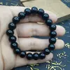 Pulsera de obsidiana cuentas de vidrio negro anillo único pulsera de cuentas de Buda decoración de mano para hombres y mujeres suministro de puesto de lugar escénico venta al por mayor