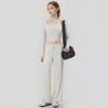 Nuevo Conjunto de Pilates y Fitness Otoño/Invierno 2026 de Manga Larga con Cuello Halter Dos en Uno con Almohadillas Integradas en el Pecho, Conjunto de Yoga de Corte Holgado