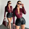 60567 Estilo callejero transfronterizo europeo y americano, top corto ajustado a la cintura, cremallera, elástico, cuero PU, chaqueta corta para mujer