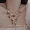 Nuevo collar de mariposa de cristal con cuentas Maillard de estilo chino apiladas para clavícula, estilo francés retro elegante, combina con todo.