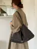 Bolso vintage transfronterizo para mujer, bolso tote grande de gamuza suave, nuevo bolso de hombro simple de moda para el invierno 2025