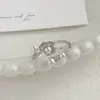 Anillo Metálico de Lujo Ligero con Perla Rosa para Mujer, Anillo Único para Dedo Índice con un Diseño Distintivo, Anillo Abierto Ajustable