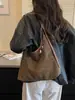 Bolso de mano retro estilo francés con acabado mate, nueva colección otoño 2026, bolso de hombro moderno, adecuado para uso diario, ir al trabajo y como bolso cruzado pequeño