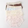 Nueva Tanga de Mujer Estilo Coreano Puff de Leche Seda de Hielo Cómoda Sin Costuras Algodón Puro Entrepierna Extendida Cintura Media Sin Pellizcos
