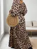 Comercio exterior transfronterizo europeo y americano talla grande otoño 2026 nuevo elegante vestido de longitud media con cuello redondo y estampado de leopardo