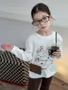 Aimo Beibei 2026 Otoño Nueva Ropa Infantil para Niñas Estilo Coreano Casual Camiseta de Manga Larga con Estampado de Gato Lindo