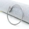 Pulsera Abierta Elástica Estilo Alambre para Uñas Personalizada de Acero Inoxidable de Alta Gama, Superventas Transfronteriza Europea y Americana, Venta al por Mayor con un Tacto Premium