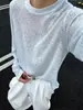 Nueva camiseta base para hombre de primavera y otoño, marca de moda, cuello redondo, jersey de manga larga, moda elegante, versátil, cómoda, informal