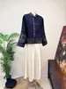 Zhi Li Jaqueta Jacquard Bordada Elegante Estilo Chino Nuevo Cuello Alto Otoño 2026 Nuevo Estilo Nacional Lujo Ligero Top para Mujer