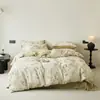 Nuevo juego de ropa de cama de cuatro piezas de gasa doble estampada, grado A, apto para bebés y madres, ropa de cama tejida estampada de doble capa para todas las estaciones