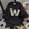 2026 Verão Nova Marca da Moda Pesada Retrô Hip-Hop Estampa de Letras Manga Curta Camiseta Casal Solta Versátil Top