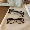 2024 nuevo marco de gafas ojo de gato color castaño lente plana para miopía color liso artefacto marco de moda