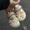 Al por mayor transfronterizo Calzado tipo zueco infantil Charms para zapatos Lazo lindo de niña Manzana Gato Decoraciones Accesorios