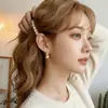 Pendientes de alta gama estilo retro francés, modernos y versátiles para el uso diario, con detalles de cinta y perlas, pendientes de lujo ligero