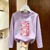 Camiseta de manga larga para niña 2026 primavera y otoño elegante camiseta básica de algodón puro para niños mayores con diseño de dibujos animados top de moda