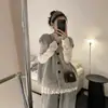 Colete de tricô vintage de botão único estilo francês para mulheres, novo suéter em camadas outono e inverno 2026, top de outer wear soltinho
