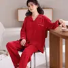 Pijama de algodón de manga larga y pantalón largo para mujer, disponible en stock para venta al por mayor, de color rojo brillante, adecuado para el año zodiacal, bodas, transmisiones en vivo y uso doméstico.
