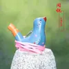 Puesto de viaje de pájaro acuático de arena púrpura Yuerui silbato de animal creativo decoración de pájaro silbato de cordón de cerámica lugar escénico Memorial