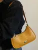 Bolsa de ombro Shuai Mi Jia nicho retrô texturizada 2026 verão nova simples bolsa baguette corrente de ombro pequena quadrada