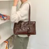 Bolso de mano retro estilo commuter color marrón Melard para mujer, nuevo modelo de moda 2026 de gran capacidad, bolso tote de alta gama