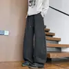 Calidad TikTok Otoño 2026 Nuevo Estilo Americano Bolsillo con Diseño de Retazos Pantalones Deportivos Sueltos Casuales para Hombre con un Toque de Alta Gama
