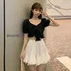 Mini Falda Negra Abullonada Dulce y Elegante para Mujer, Versátil y Adelgazante, Nuevo Estilo Coreano para Verano 2026