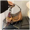 Bolsa de ombro fashion de grande capacidade, nova bolsa de mão feminina versátil simples de alta qualidade, bolsa feminina marrom versão coreana