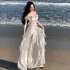 Estilo vacaciones de verano en la playa falda de tirantes de punto vestido de una pieza con volantes estilo francés